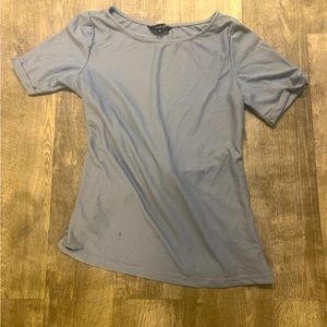 Light blue T-shirt, open back with tie size medium